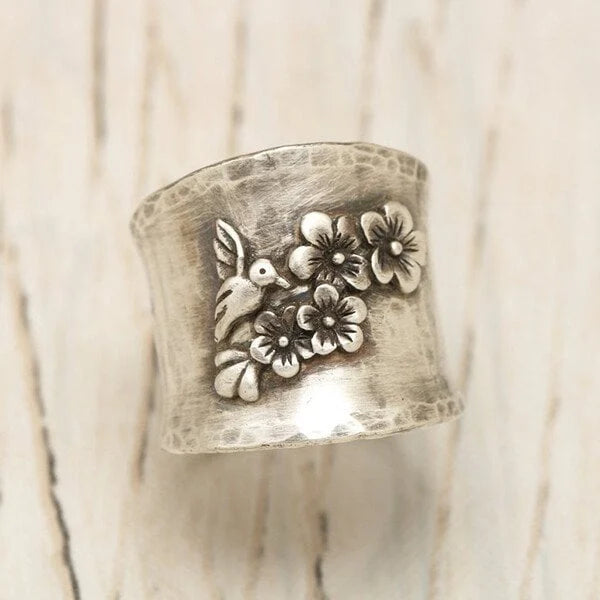 Anillo ancho con diseño de flor de pájaro
