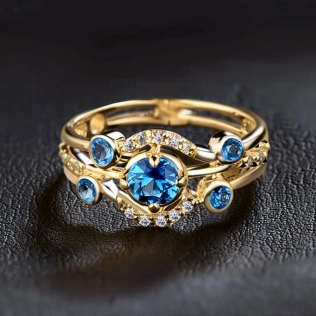 Bague en or avec zircon bleu et zircone superposée