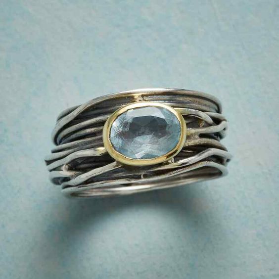 Bague vintage en argent à plusieurs rangs et pierre bleue
