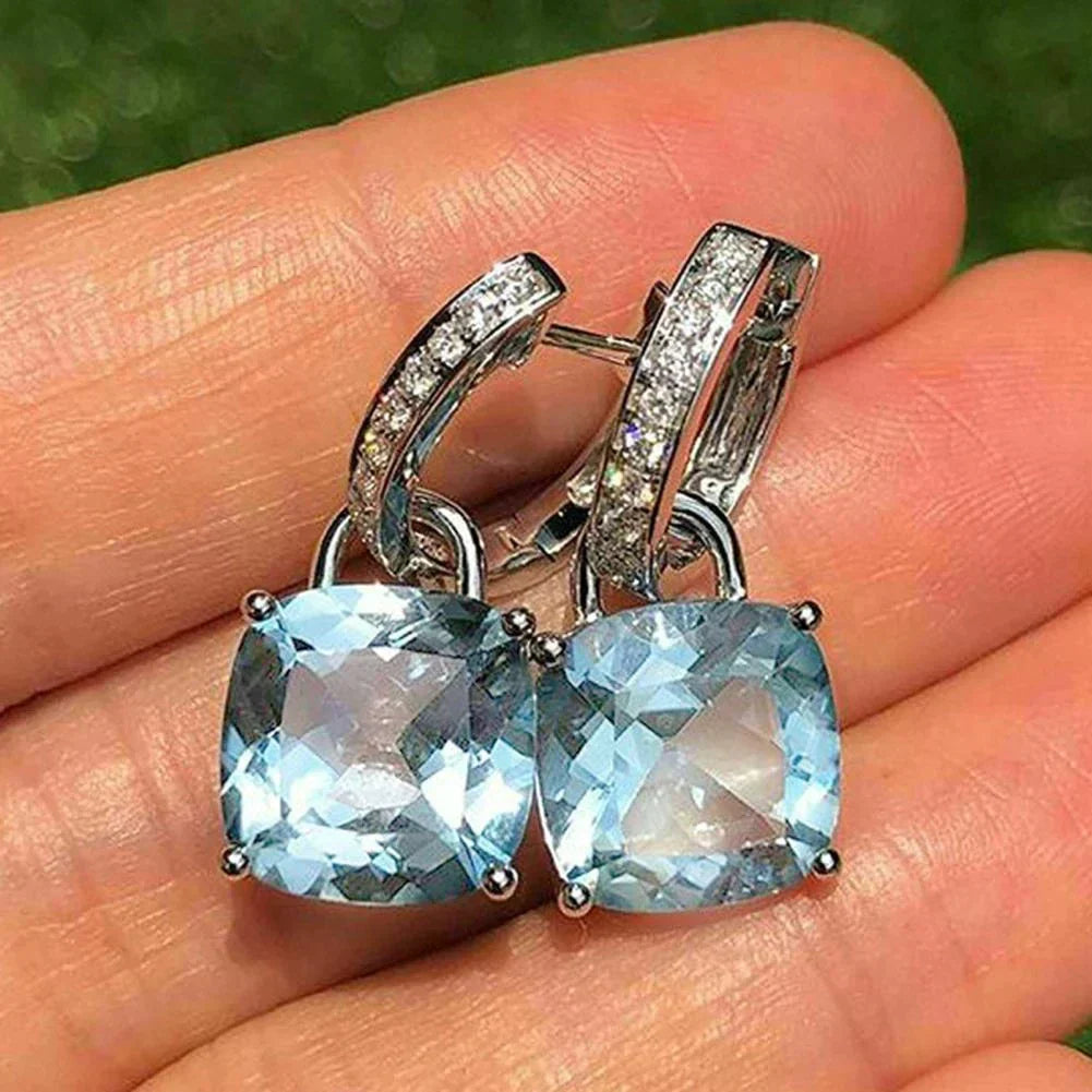 Boucles d'oreilles en cristal bleu et argent