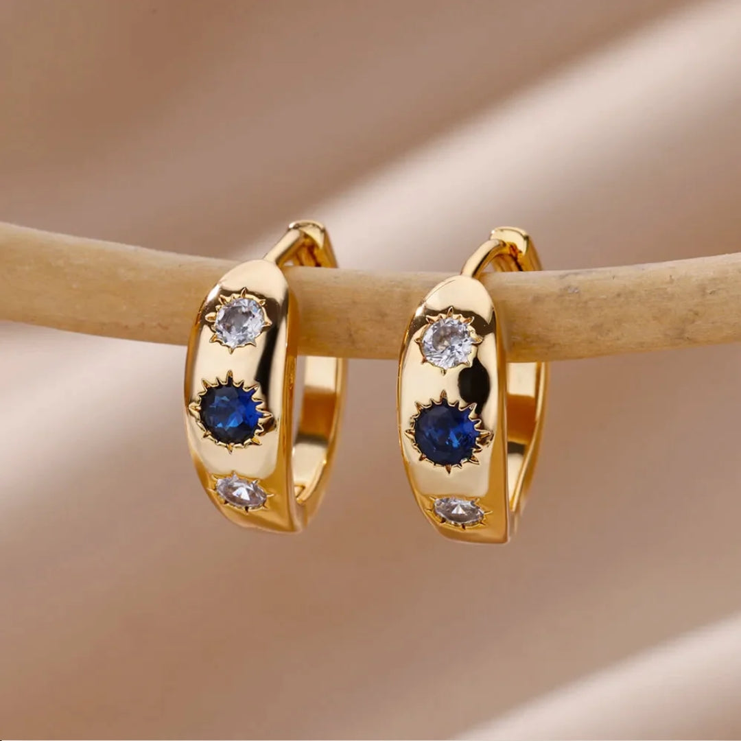 Pendientes con incrustaciones de cristal azul dorado