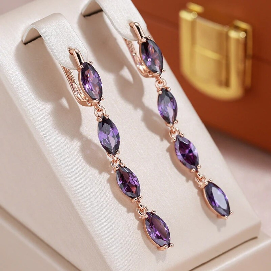 Boucles d'oreilles pendantes élégantes en cristal violet