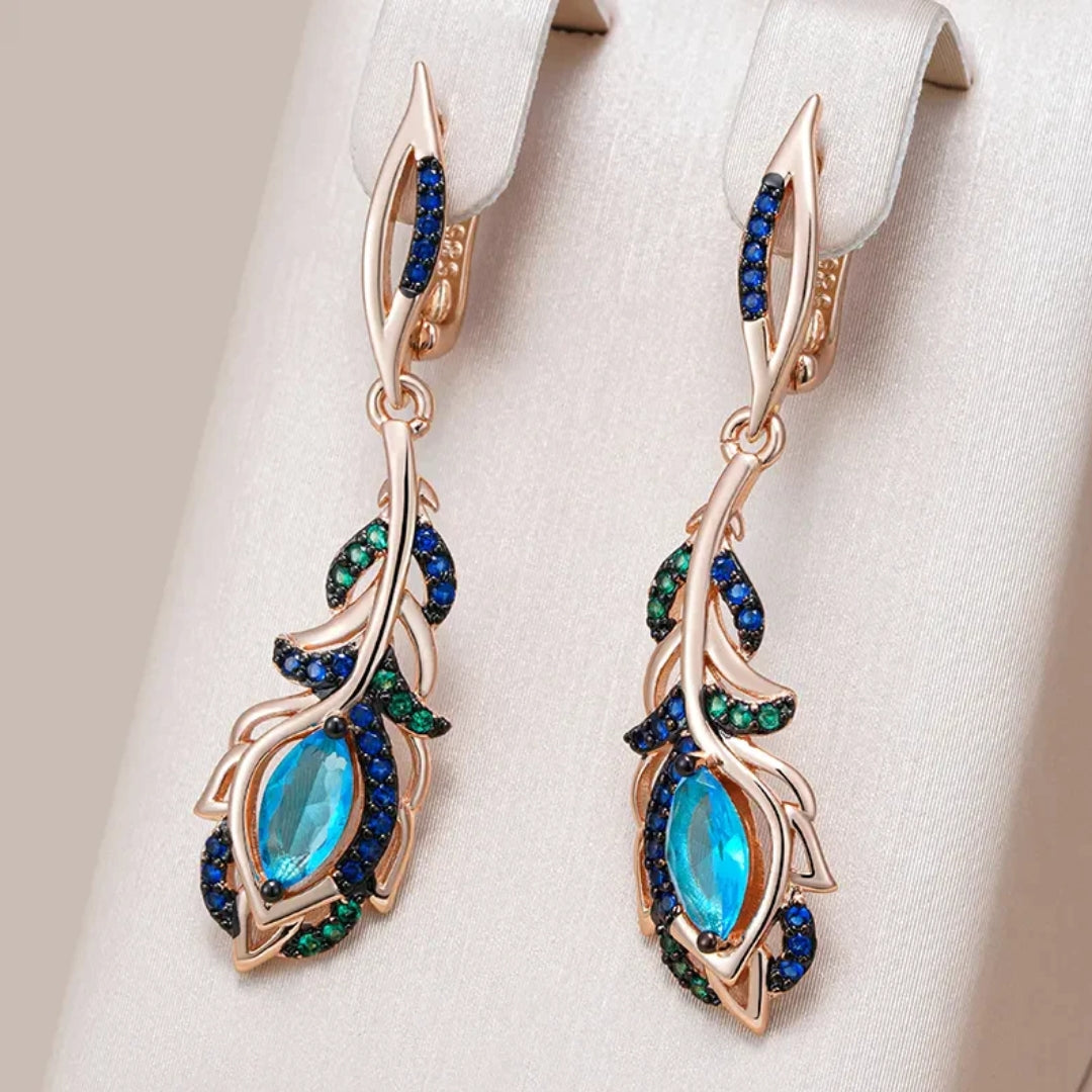Boucles d'oreilles pendantes élégantes en cristal bleu