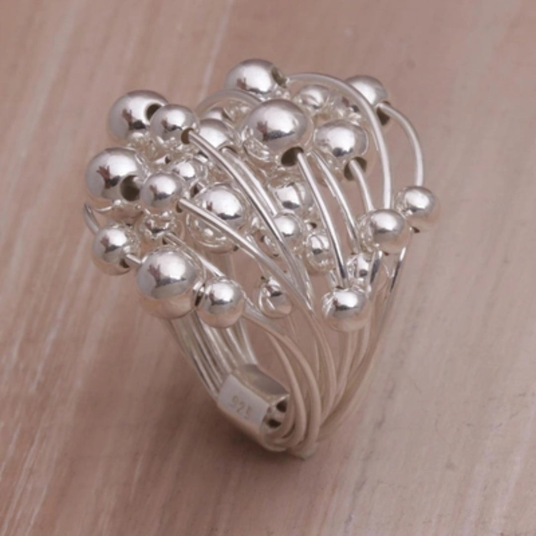Anillo vintage de plata con brotes de plantas