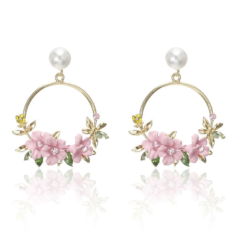 Pendientes de flores y perlas en oro