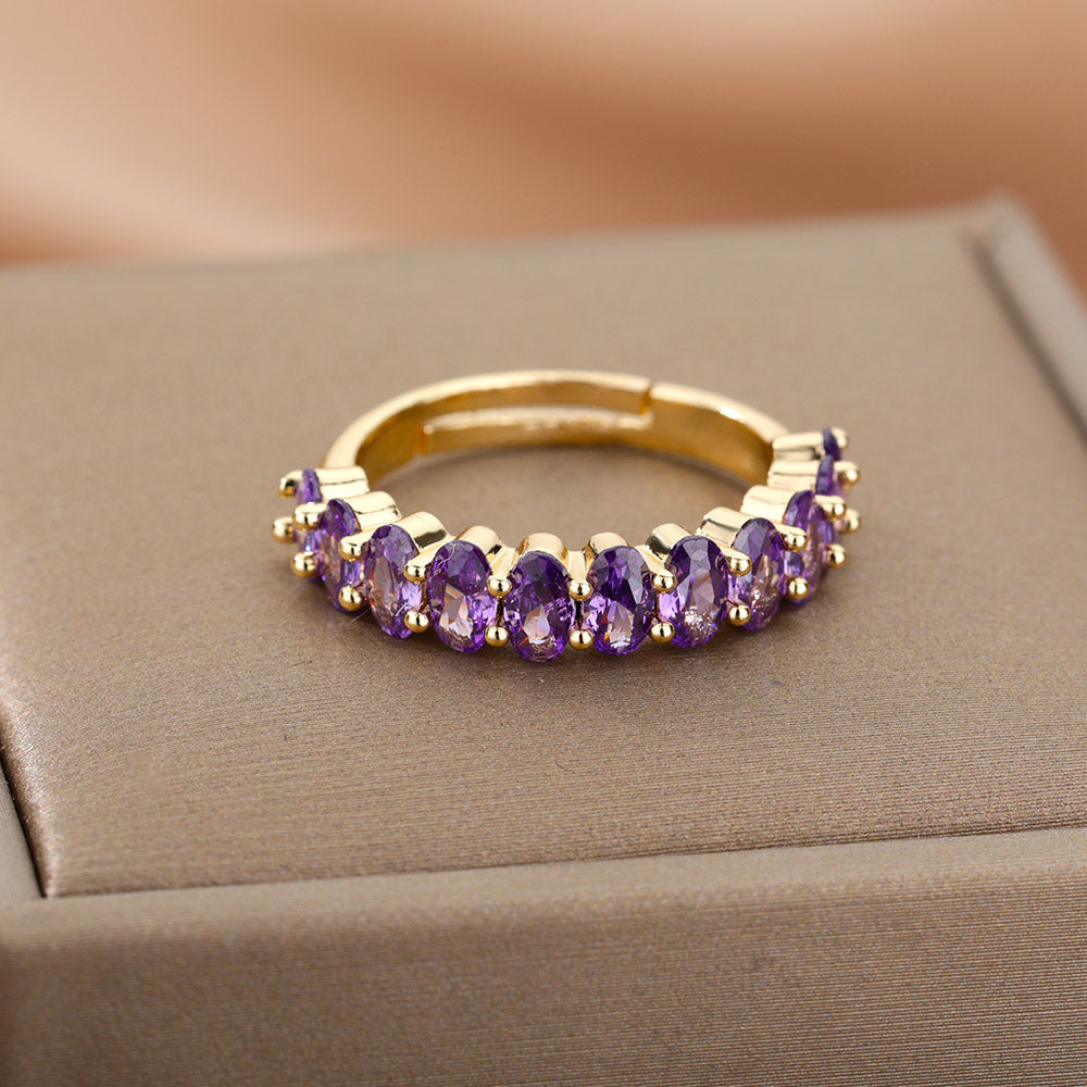 Anillo ajustable de circonita morada en oro