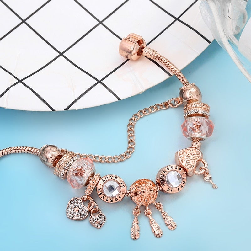 Pulsera atrapasueños de rosas con dijes incluidos en plata de ley