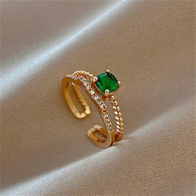 Bague ajustable en or avec zircon vert