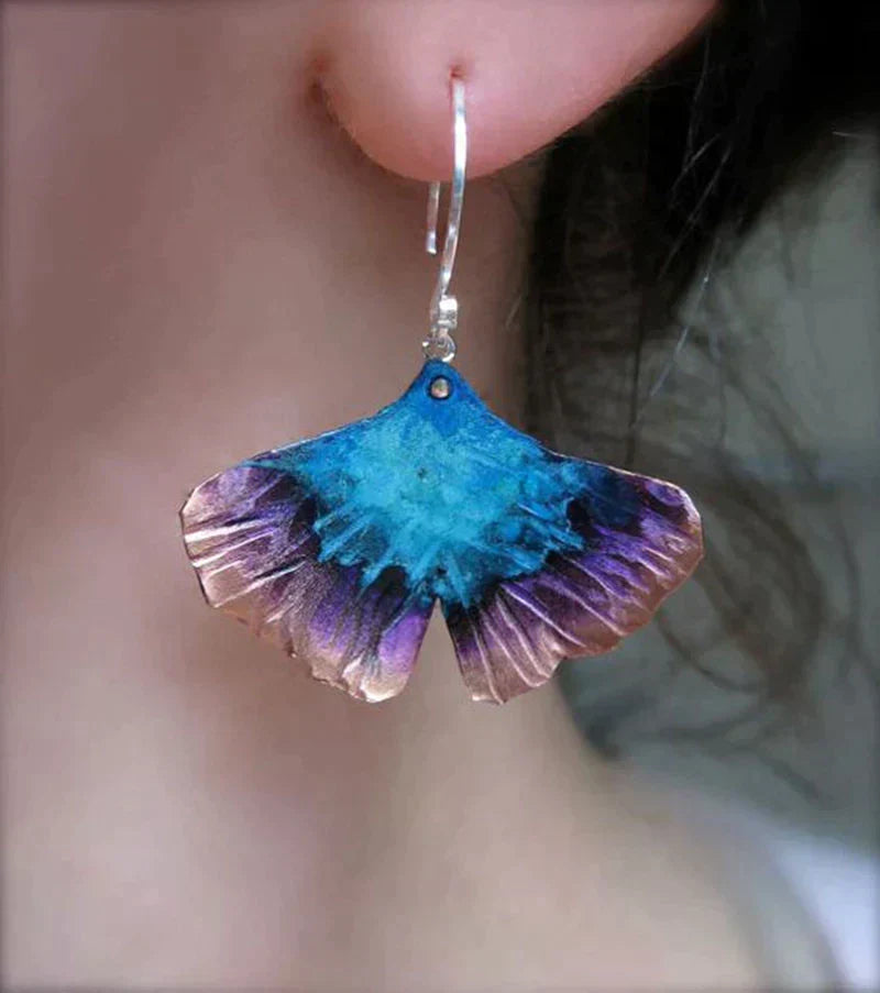 Pendientes bohemios de mariposa azul en plata de ley