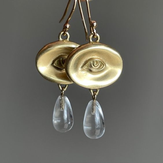 Pendientes vintage de cristal con forma de ojo dorado