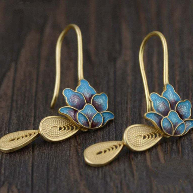 Boucles d'oreilles bohèmes lotus bleu en or