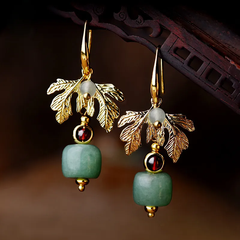 Boucles d'oreilles vintage en zircon rouge doré