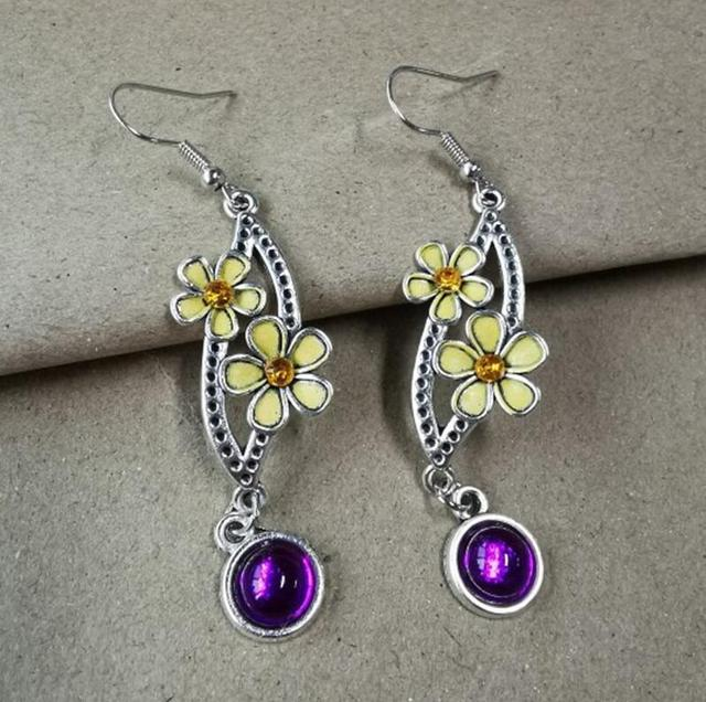 Boucles d'oreilles vintage en argent et zircon violet