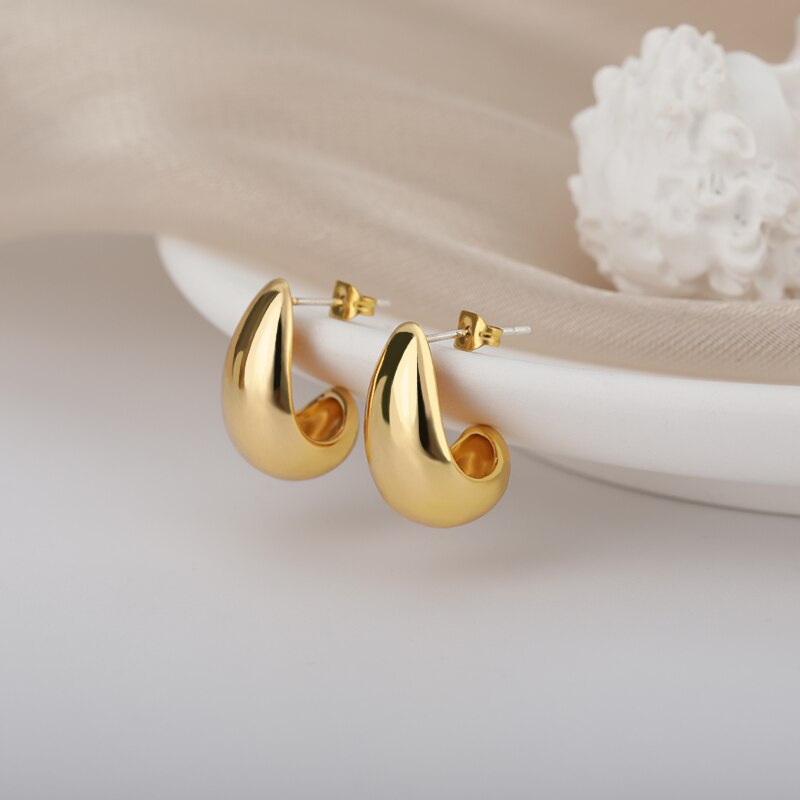 Pendientes elegantes dorados