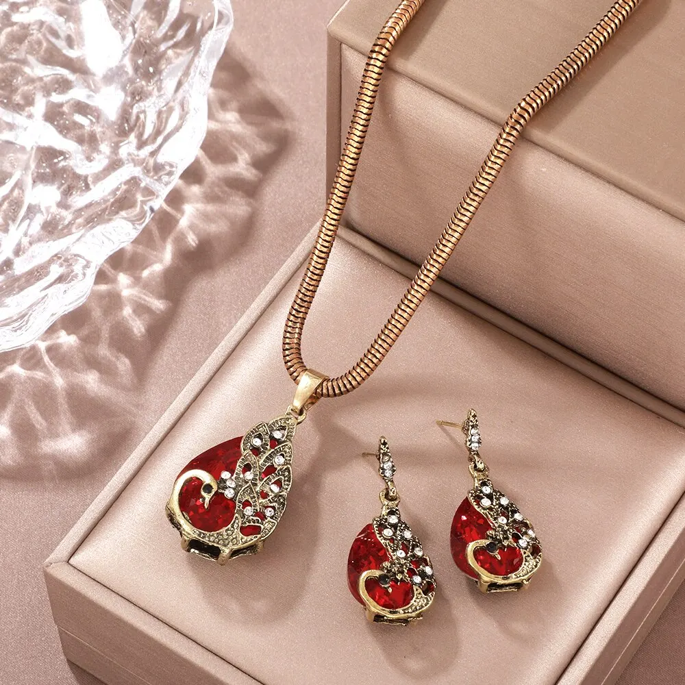 Elegante juego de gotas de cristal rojo