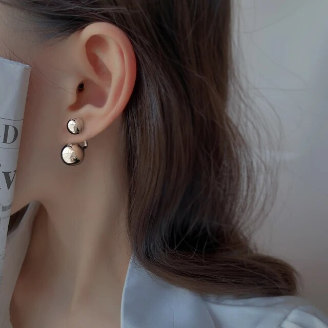 Pendientes vintage de esfera dorada