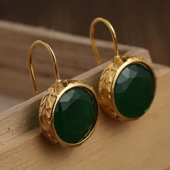 Pendientes vintage dorados con circonitas verdes