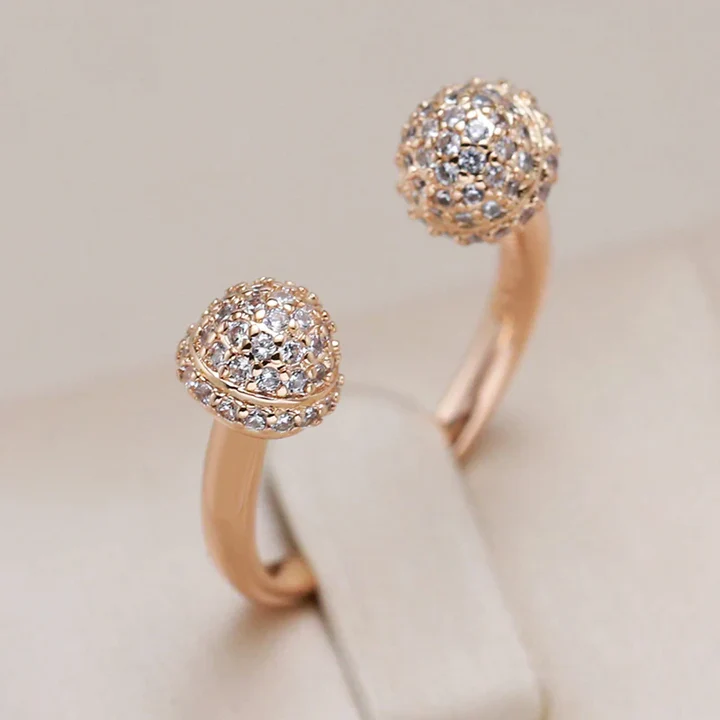 Bague élégante à sphères lumineuses ouvertes