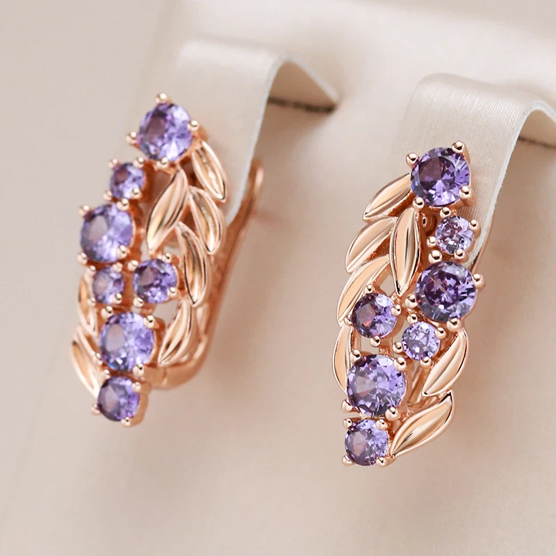 Elegantes pendientes de cristal morado brillante
