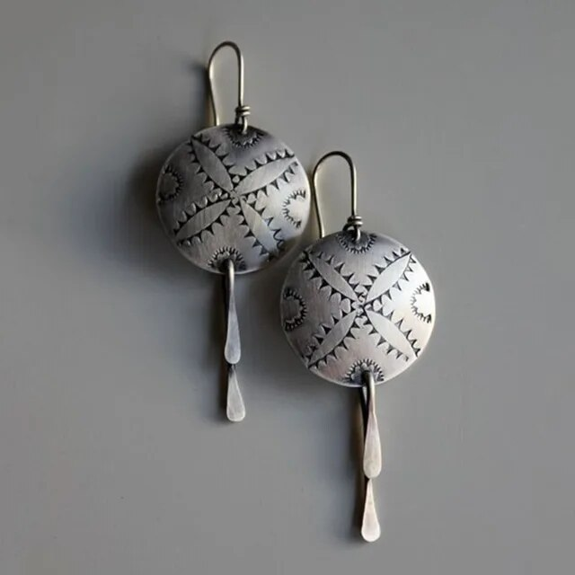 Boucles d'oreilles pendantes vintage en argent avec bouclier