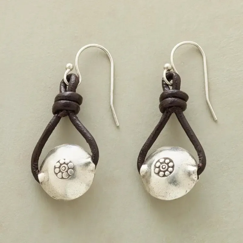 Boucles d'oreilles vintage en cuir argenté