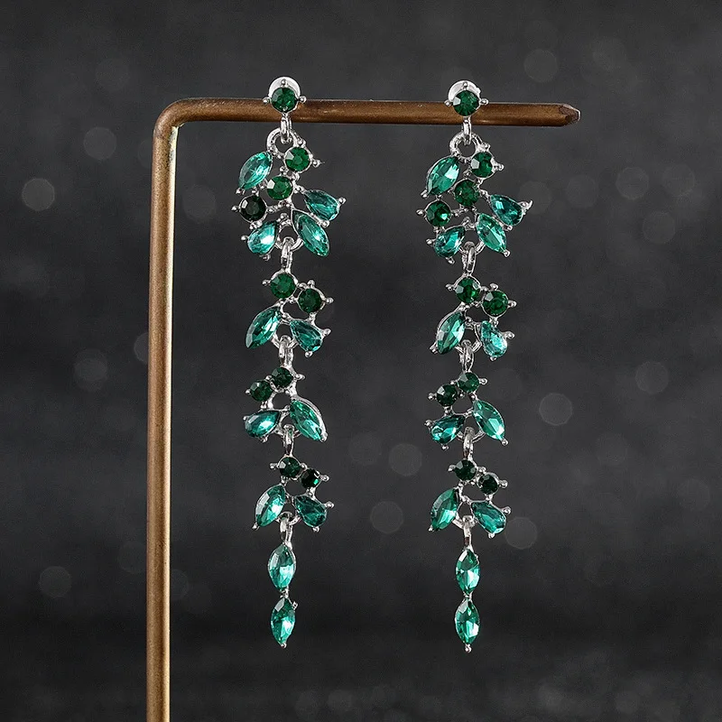Boucles d'oreilles pendantes vintage en cristal vert