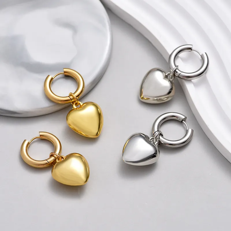Boucles d'oreilles cœur en or et argent