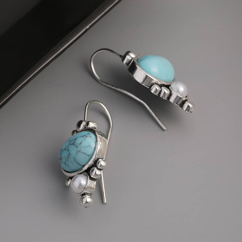 Pendientes vintage de perla con piedra azul cielo