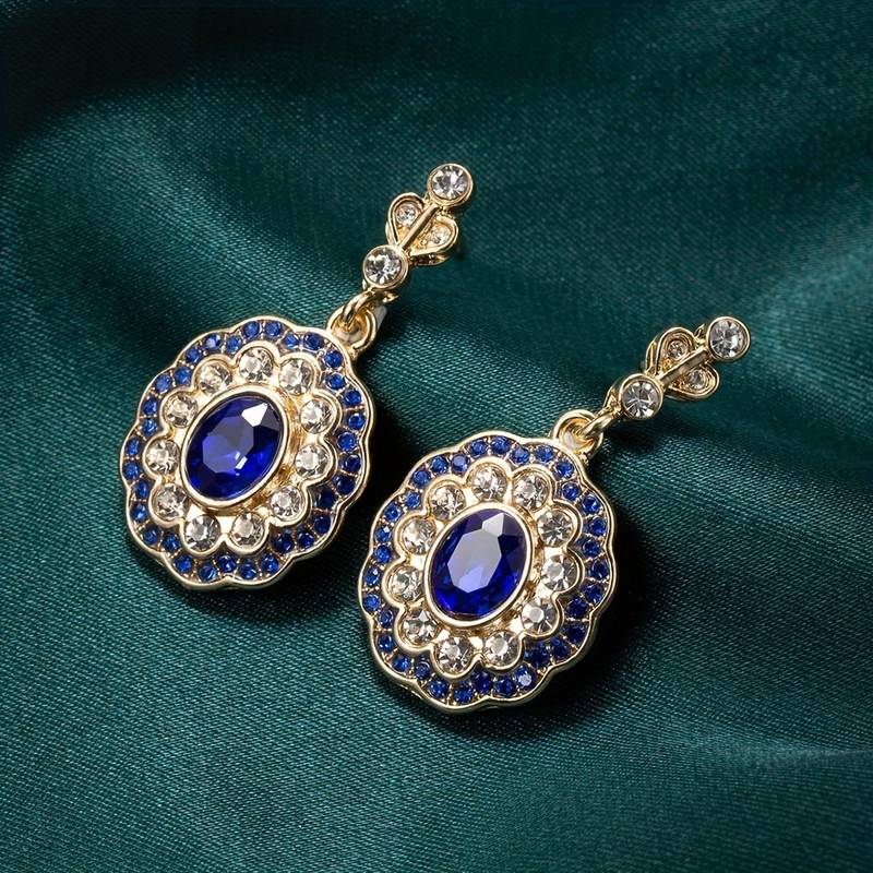 Boucles d'oreilles mandala en cristal bleu sur monture or vintage