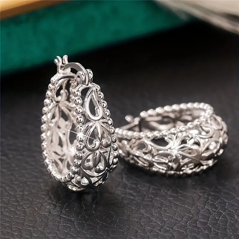 Pendientes vintage de plata con forma de cesta hueca y brillante
