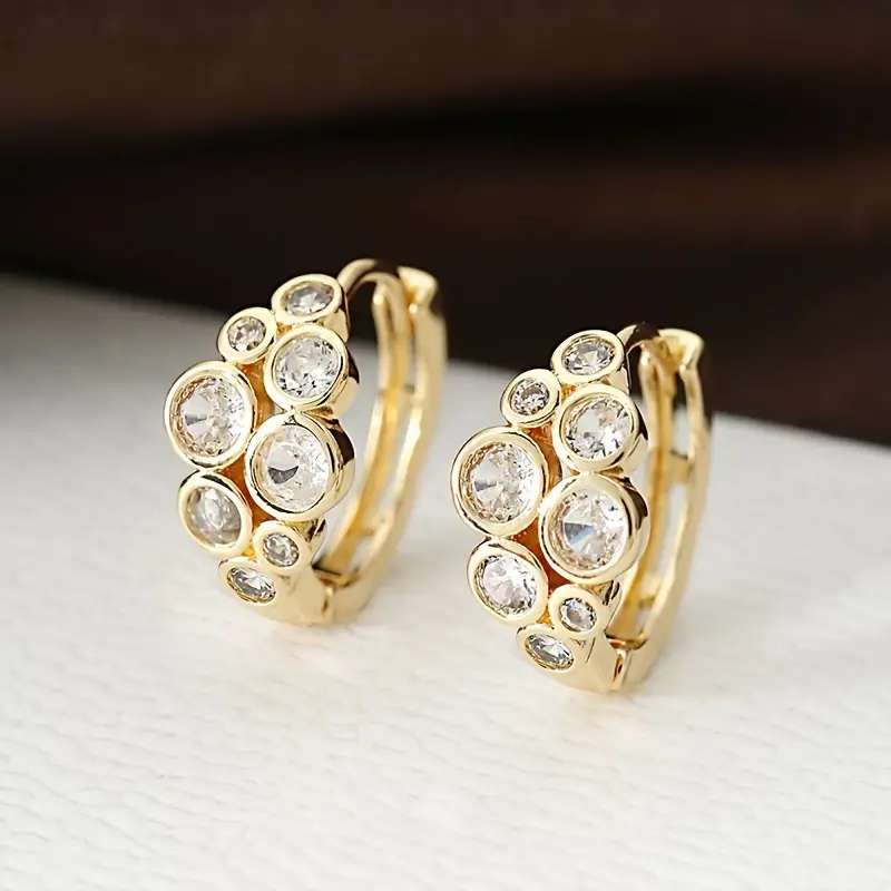 Pendientes vintage de oro con incrustaciones de circonita