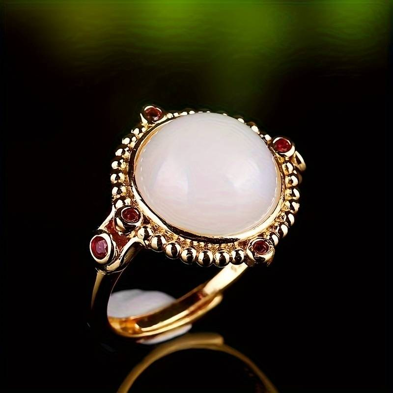 Bague vintage en or et opale blanche