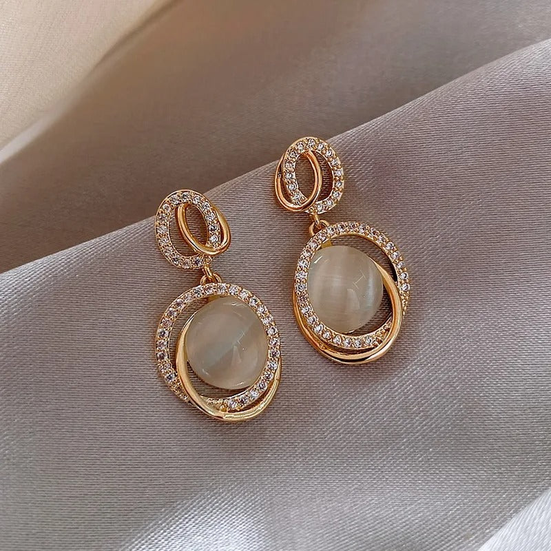 Pendientes de aro ovalados vintage de oro y cristal