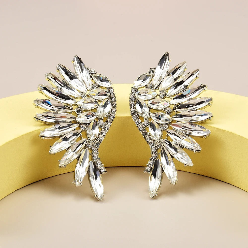 Boucles d'oreilles vintage argentées en cristal et ailes