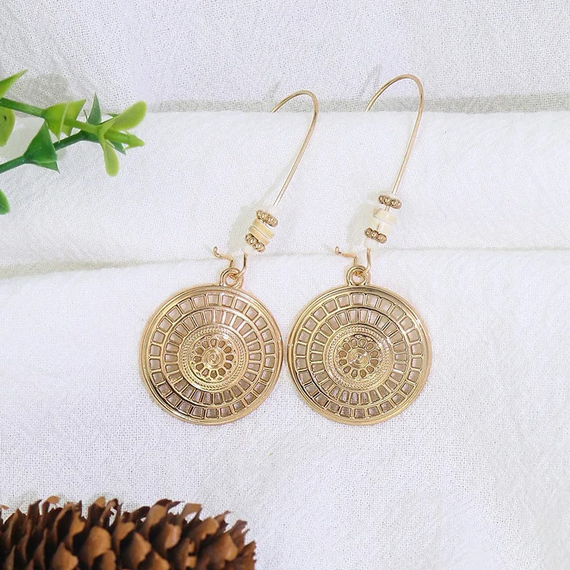 Pendientes vintage de disco de mandala dorados