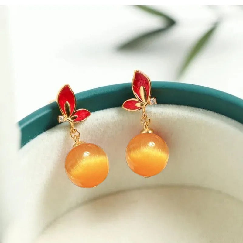 Pendientes vintage de mariposa dorada y roja con forma de lágrima naranja