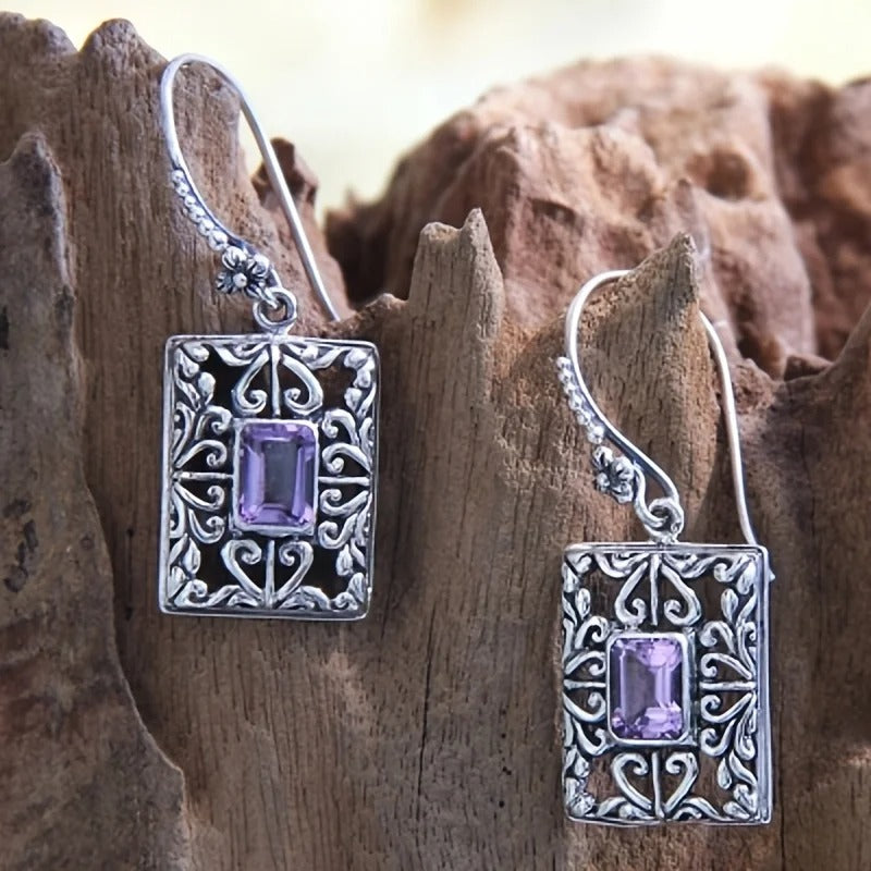 Boucles d'oreilles vintage en argent et pierres violettes