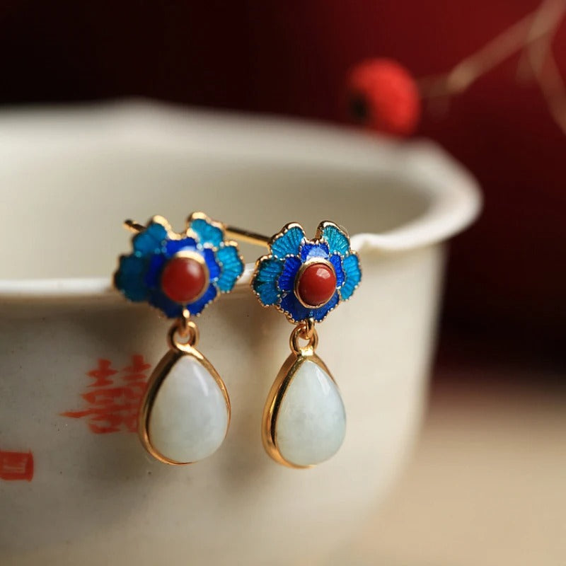 Pendientes colgantes con piedras preciosas rojas y blancas con diseño floral retro dorado y azul