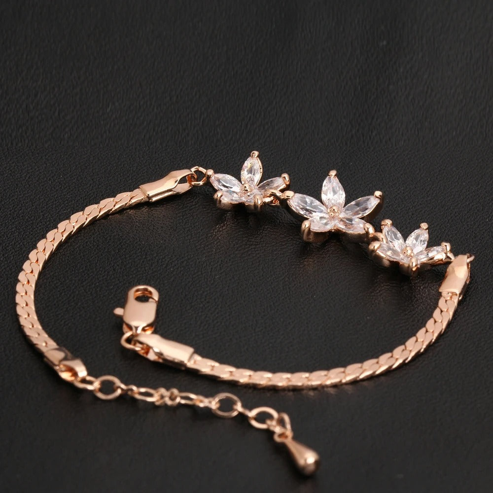 Pulsera vintage de oro rosa con diseño floral de cristales