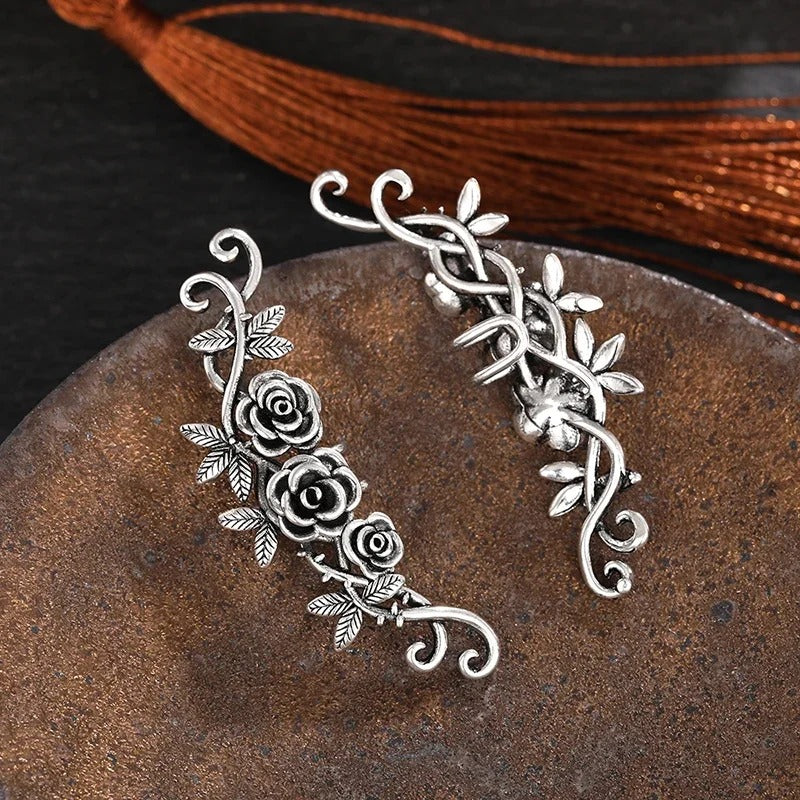 Boucles d'oreilles vintage argentées à motif floral