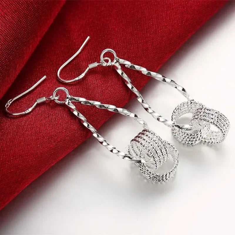 Boucles d'oreilles pendantes vintage en argent avec nœud