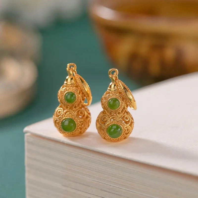 Pendientes colgantes de calabaza con piedras preciosas verdes y doradas vintage