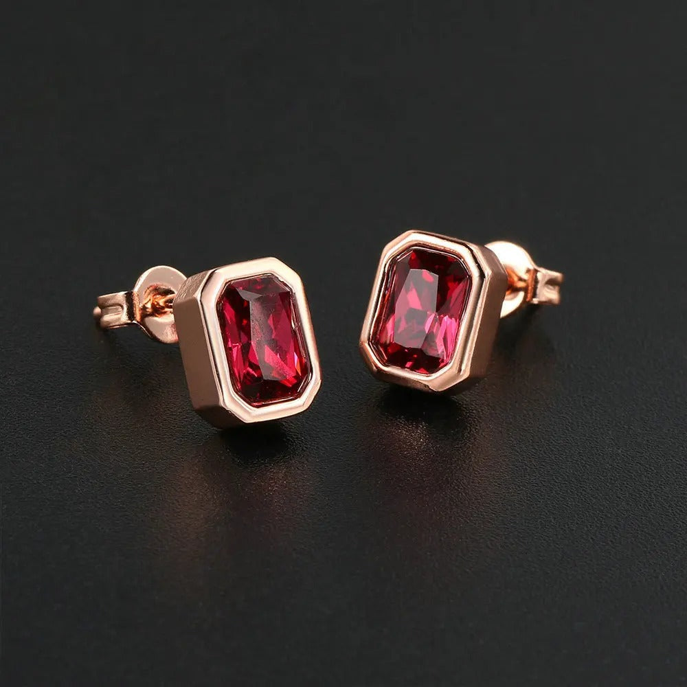 Pendientes vintage de oro rosa con cristales de color rojo intenso