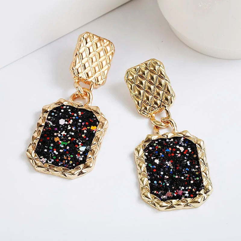 Pendientes vintage dorados y negros brillantes