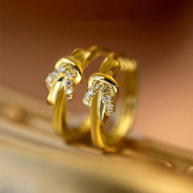 Pendientes vintage de cristal con nudo dorado