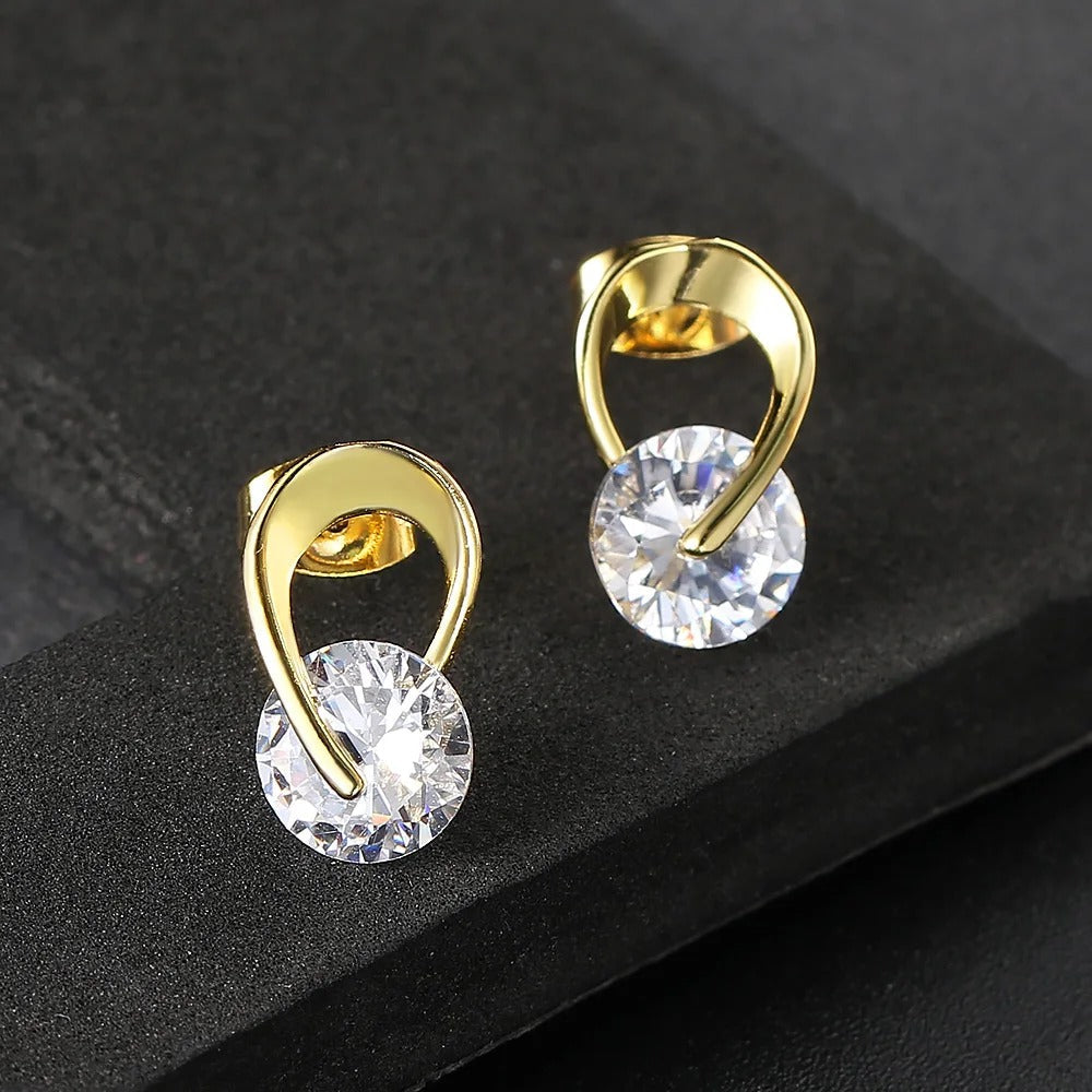 Pendientes vintage de oro y piedras preciosas transparentes