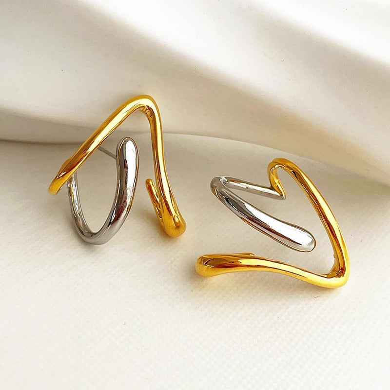 Pendientes de aro vintage abstractos de oro y plata con diseño torcido