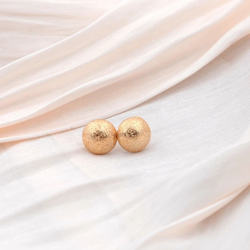 Pendientes vintage de media caña dorados