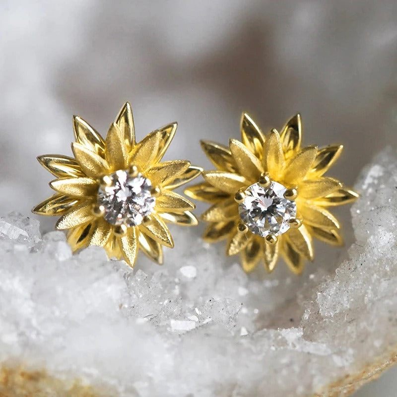 Pendientes vintage de flores radiantes de oro