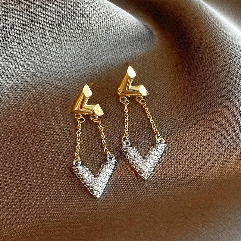 Pendientes colgantes de cristal en forma de V de oro y plata